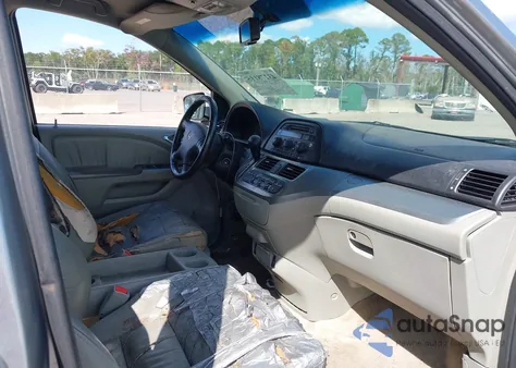 2010 Honda Odyssey Ex-L z USA, uszkodzony, nr VIN 5FNRL3H63AB011747